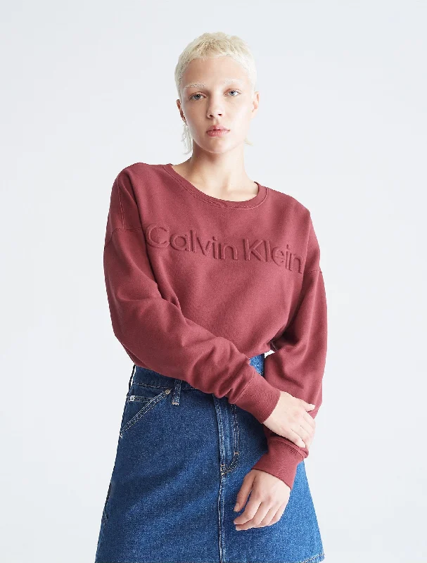 Calvin Klein Oversized Embossed Logo Crewneck Sweatshirt - Women Hoodie with Set-In Sleeves Structured Classic Calvin Klein Oversized Embossed Logo Crewneck Sweatshirt - Women Hoodie with Set-In Sleeves Structured Classic